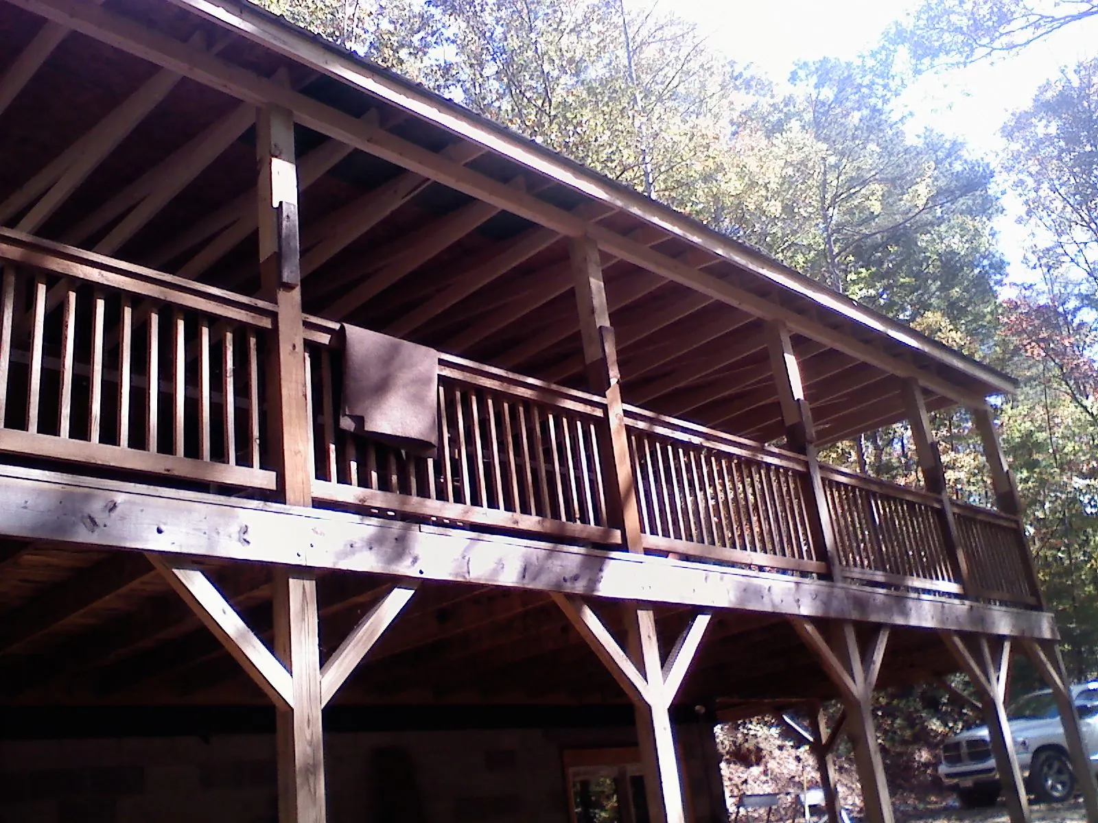 Timber framing under a new elevated porch and deck — Roof Leak Repair in Calmar by Roofing Brothers